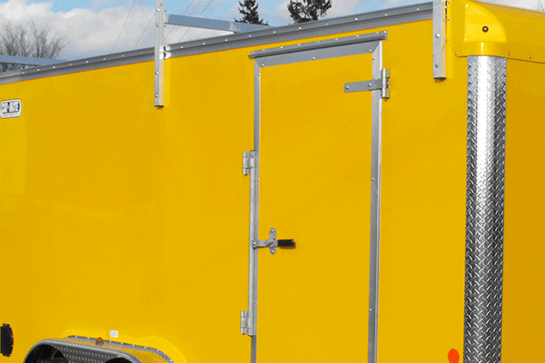 yellow trailer with aluminum skin